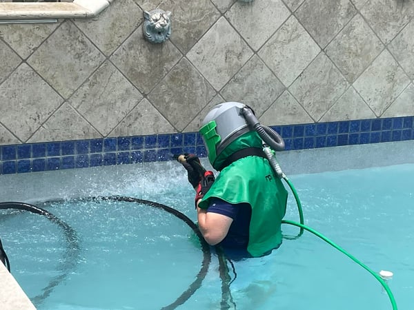 Cleaning pool tiles