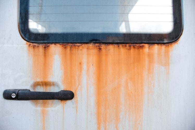Thin layer of rust on a door panel